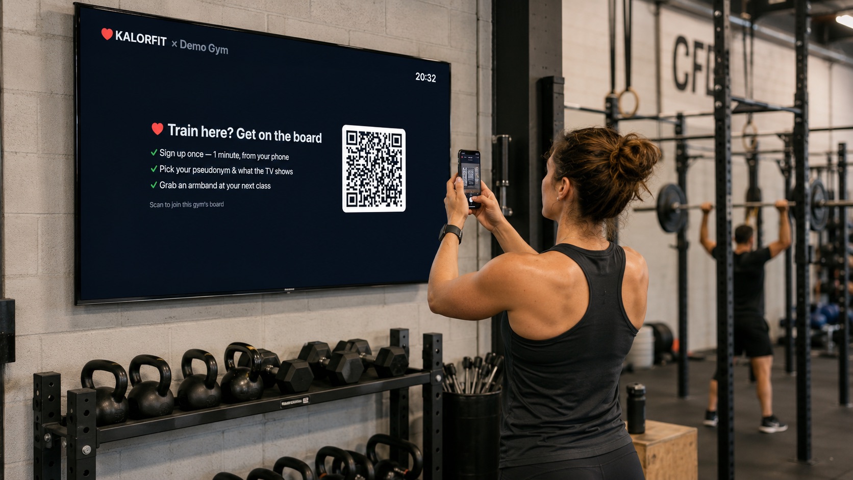 A member scanning the join QR on the gym TV's idle screen